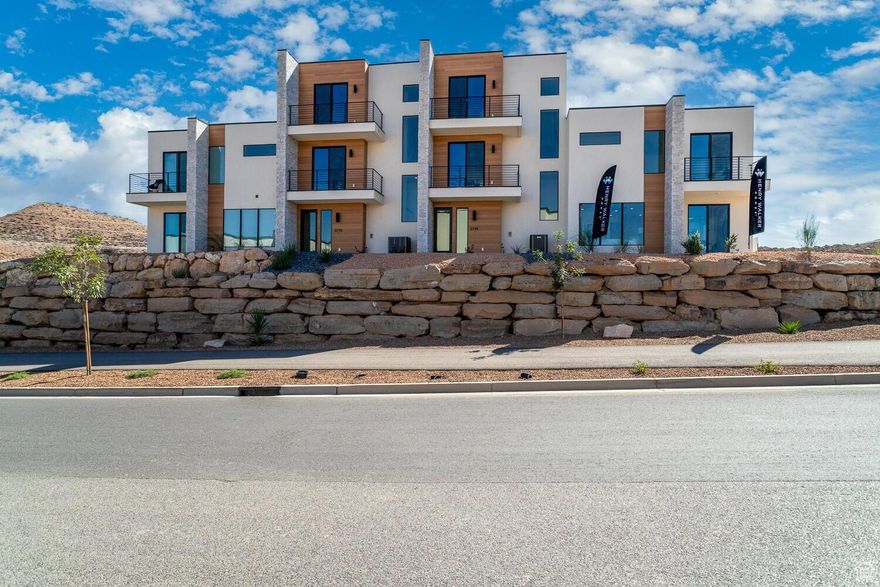 LIMITED-TIME OFFER! Builder offering a 3.99% interest rate with a 3-2-1 buydown when using the preferred lender. Just minutes from Sunbrook Golf Course, this beautiful 3-bedroom, 2.5-bath townhome combines modern comfort, quality construction, and stunning views of the Red Rocks and Pine Valley Mountains. Approved for 30+ day rentals, it's perfect as a primary home, vacation getaway, or investment. Enjoy nearby dining, shopping, and endless outdoor recreation in one of Southern Utah's most scenic settings. Photos shown are of a similar unit—colors and options may vary. Buyer to verify all information.