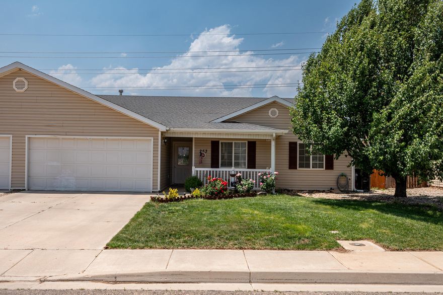 Great home in a quiet Cedar City neighborhood! This 3-bedroom, 2-bath twin home offers 1,450 square feet of comfortable living space, all on one level. The home features tile flooring in high-traffic areas, solid surface countertops, and nice sized living room. You'll also love the fireplace. The kitchen comes with all major appliances and opens to a dining area that's just the right size. Outside, the fenced backyard is ready for your personal touch, and the 2-car attached garage offers added convenience. The lot is a nice 5,227 square foot lot. Located in the Lamplight subdivision with no HOA, this home is close to schools and local amenities. Set up a showing today!