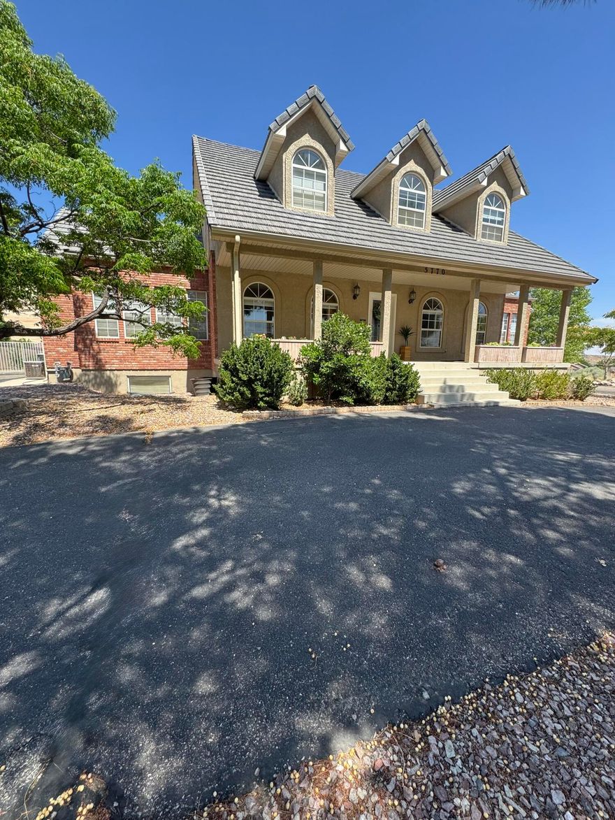 ***Views Views***This large home has over an acre of land and incredible surrounding views. Enjoy being just 10 minutes from town with slightly cooler temps, darkened skies, trails, and close proximity to  Snow Canyon State Park. This home also offers a large deck with a covered patio, a full basketball court, fruit trees, raised garden boxes, and a covered indoor pool. The enclosed pool has a diving board and a slide. The interior of the home has an open concept with 5 bedrooms and 4.5 bathrooms, spacious family rooms, storage rooms, and additional flex rooms. 
Call or text the agent to schedule a showing today.