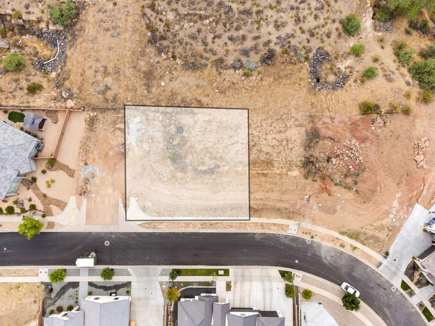 Bring your own builder and get your dream home started. This lot is located in the beautiful Hill at Santa Clara Subdivision. Walk out basement, No HOA. Come enjoy the views, nature, trails and more. Short drive to Snow Canyon State Park and Tuacahn Amphitheater.

Photo boundaries are approximant. All information is deemed reliable but not guaranteed. Buyer to verify all information.