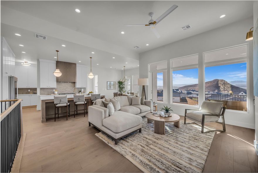 Welcome to 2098 Pinto in The Heights at Washington Bench.  This brand new multi generational home built by Rigby Construction is sure to impress and is move-in-ready.

The incredible hillside location is a dream setting with unobstructed views of the surrounding St George Valley and no backyard neighbors!

Featuring 3700 square feet, 6 bedrooms, 5 bathrooms, gourmet kitchen with designer touches, luxurious primary suite, upstairs fireplace, spacious balcony, full basement kitchen and dining nook, climate controlled basement storage, built in locker mudroom, designer upstairs laundry room, basement stacking laundry, 2x6 construction, upgraded insulation, 8' doors, tankless water heater, designer lighting throughout, RV garage, and more!

Outside features full 360º landscaping, complete backyard fencing, and huge lawn area with room for enhanced outdoor entertaining, a pool, or sport court.