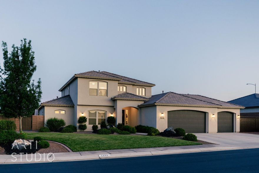 Discover your dream home in this stunning 4-bedroom, 3.5-bathroom masterpiece, perfectly blending luxury and functionality. This residence boasts expansive, light-filled rooms with high-end finishes, including elegant quartz countertops and premium luxury flooring throughout. The chef's kitchen is a culinary haven, equipped with top-of-the-line appliances and ample space for creating gourmet meals.

Step outside to a massive backyard, ideal for entertaining or relaxing while soaking in breathtaking mountain views. The attached 3-car garage offers abundant storage and convenience. Adventure awaits just minutes away, with close proximity to ATV and mountain bike trails, as well as the scenic Sand Hollow Reservoir. This home is a rare gem.  Come see it today!