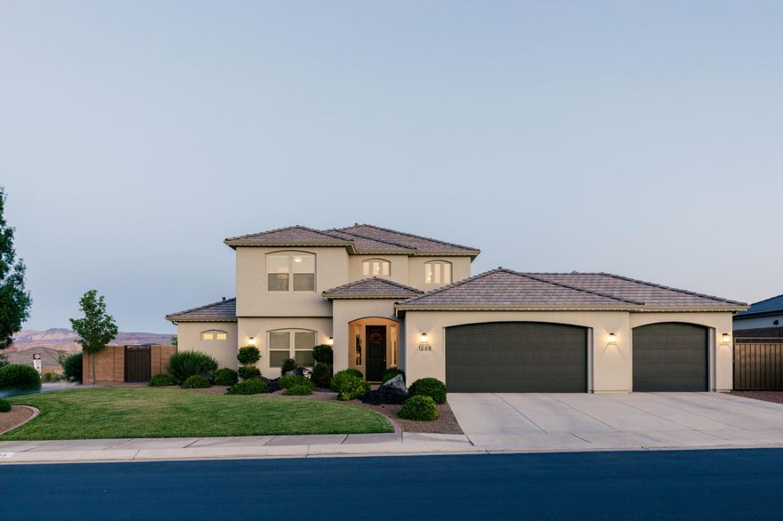 Discover your dream home in this stunning 4-bedroom, 3.5-bathroom masterpiece, perfectly blending luxury and functionality. This residence boasts expansive, light-filled rooms with high-end finishes, including elegant quartz countertops and premium luxury flooring throughout. The chef's kitchen is a culinary haven, equipped with top-of-the-line appliances and ample space for creating gourmet meals.

Step outside to a massive backyard, ideal for entertaining or relaxing while soaking in breathtaking mountain views. The attached 3-car garage offers abundant storage and convenience. Adventure awaits just minutes away, with close proximity to ATV and mountain bike trails, as well as the scenic Sand Hollow Reservoir. This home is a rare gem.  Come see it today!