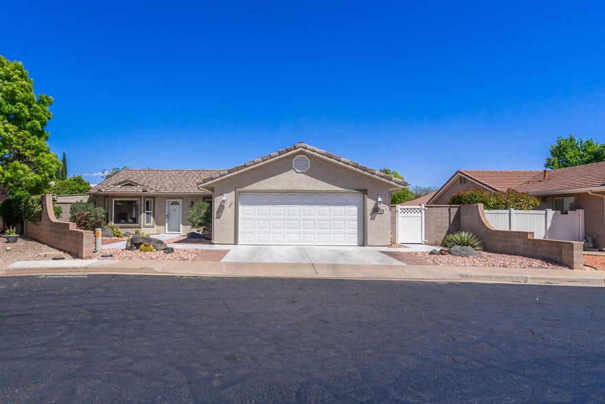 Tucked away in the desirable Ivins community, this charming and well-maintained 3-bedroom, 2-bath home sits on a prime corner lot and offers the perfect blend of comfort, privacy, and scenery. The pristine backyard is a true standout, featuring a million-dollar view of Red Mountain--an ideal setting for relaxing evenings or quiet mornings.

Located in the welcoming 55+ community of Elfin Cove, residents enjoy the peace of a private street along with access to a residents-only park. The neighborhood is perfect for leisurely walks, bike rides, and enjoying the beautiful Southern Utah surroundings.

Elfin Cove offers a low-maintenance lifestyle with an HOA that handles community landscaping, road maintenance, and park upkeep--giving you more time to focus on what matters most. Whether it's spending time with family or exploring nearby amenities, you'll love the convenience of being just minutes from hiking trails, golf courses, fishing spots, and all the shopping and dining options of St. George.

This is easy living in one of Ivins' most scenic and serene settings.