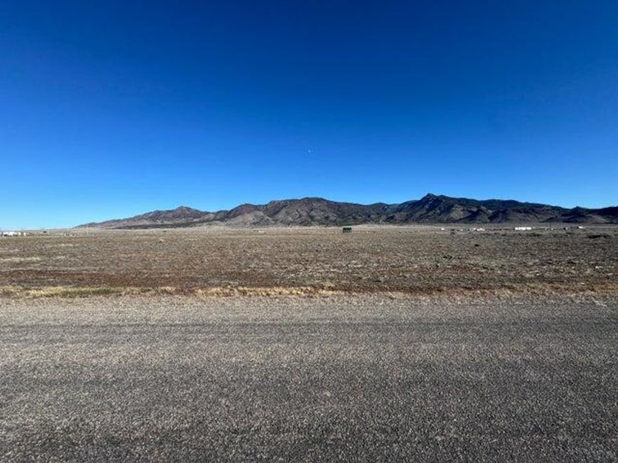 Fantastic 5ac lot available in the Broken Spur subdivision in Newcastle Utah. Right at the base of the Antelope Mountains. Paved road to the property for year round easy access. New water well installed in 2025. Pump will be installed before closing. Dixie Power line along East property line. Half acre foot of water right #71-5991 is included in the sale. Water right approved through a change application by the state in September 2025. Beautiful mountain and valley views. Build your dream home, 2nd home, or have a vacation retreat property to spend time w/ friends and family. Bring your RV, trailers, toys for getaways. Only 15 minutes to Newcastle Reservoir for boating and fishing. 50 Minutes to Cedar City or St. George. Cabin/Shed not included. 20 min to Enterprise for Food/Amenities.