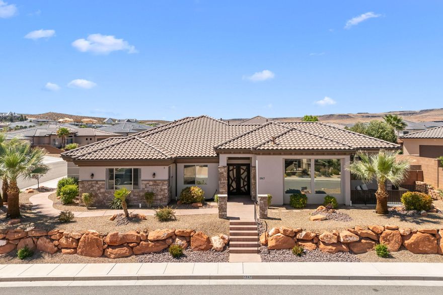 Experience the perfect blend of architectural elegance and functional design in this stunning custom-built masterpiece. 

Situated on a corner lot in Green Springs, this home is meticulously crafted to capture breathtaking, views while providing the high-end finishes and practical space today's homeowners demand.

Make a lasting impression from the moment guests arrive. The two-tone stucco exterior is anchored by magnificent custom iron doors that open into a home defined by volume and light.

With oversized windows and designer shutters one can capture the magnificent views, and determine amount of natural lighting in the home. 

This home includes tall ceilings and intricate crown molding throughout that create an atmosphere of sophisticated luxury. Designer lighting,+ fully wired for extra lighting to highlight the custom finishes and provide the perfect evening ambiance. 

Tons of storage as well as an oversized 3 car garage that is deep enough for full sized vehicles + workspace.

 Enjoy a seamless transition with all appliances included making this home truly move in ready.