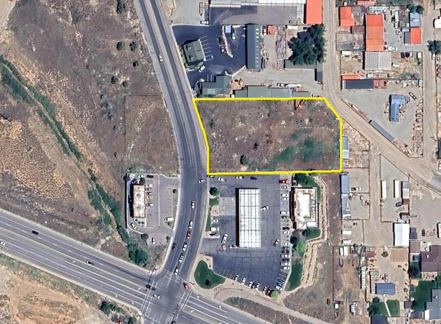 Prime I&M land on Airport Rd. Close to Hwy 56. Great potential for any I&M business! Seller financing possible on approval. Gas and power in the street.