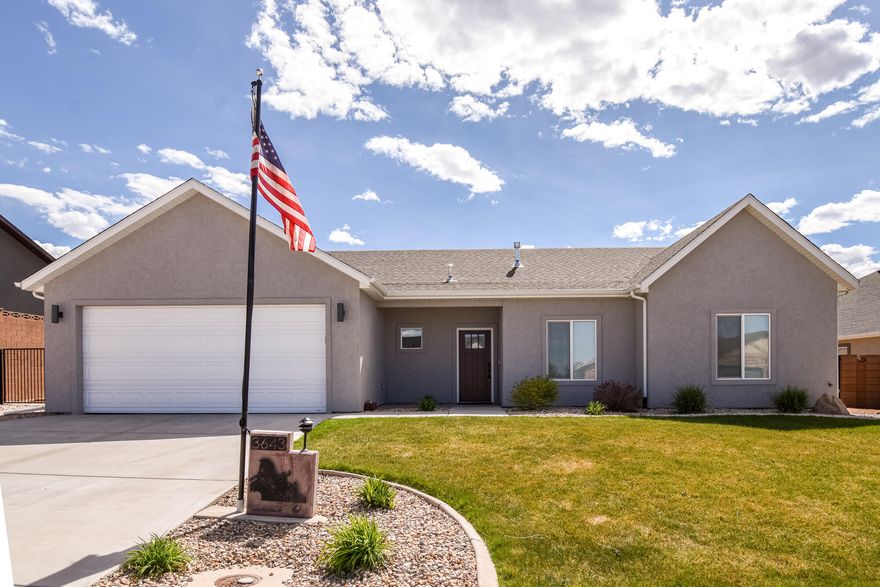 This single-level home offers easy living with no stairs! It is perfect for comfortable, worry-free living. The bright kitchen boasts granite counters, tile backsplash, a vented range hood, TWO pantries, and the refrigerator is included for the buyer's convenience. The living space has a tray ceiling, luxury vinyl plank flooring and large windows. Step outside to a gardener's dream backyard with irrigated planter boxes, seasonal bulbs, herbs and poppies. Other highlights include a shed, firepit, RV pad and gates, and a fully landscaped, irrigated and blocked yard. Don't miss this gem!