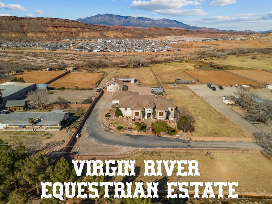 Your very own PRIVATE Virgin River Equestrian Estate on 2 ACRES with all your DREAM FEATURES, stunning VIEWS and the ultimate OUTDOOR LIVING. This fine LUXURY CRAFTED home is finished with engineered hardwood and travertine flooring throughout. The Main WALK-OUT BASEMENT Home is 5,800 sq. ft. w/ 6 bedrooms, 4 full bathrooms, & 2 half bathrooms & 2 large gathering areas. The Primary Owner Suite is on the MAIN LEVEL and the 2nd OWNER SUITE is in the basement. The spacious kitchen has 2 COPPER SINKS, Built-in APPLIANCES and GIANT HIDDEN PANTRY. The basement has a FULL 2nd KITCHEN, private THEATER with all the equipment, a 2nd LAUNDRY Room & several storage rooms. The detached GUEST QUARTERS / ADU is 600+ Sq. Ft. and comes with 1 Bedroom, 1 Bathroom, laundry area and full kitchen. The RV GARAGE is insulated with a mini-split system and includes a car lift.  Total garage space is 2305 Sq. Ft., so tons of parking for cars, trailers and toys.  This estate is ideal for hobby farm and very animal friendly w/  horse corrals, tack shed, and pastor w/ access to the Virgin River.  The BACKYARD OASIS includes a pristine SWIMMING POOL, hot tub, playground, full bathroom and BUILT-IN BBQ. 3,000 sq. ft. of COVERED PATIO space for beautiful views of Pinevalley Mountain, Virgin River and the Red Rock Candy Cliffs.