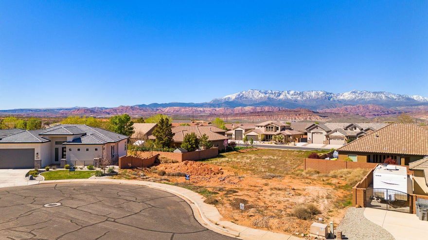 Located in desirable Dixie Springs; near fabulous Sand Hollow Reservoir and sand dunes. The walk-out basement lot is at the end of a cup-de-sac and backyard faces Northwest to capture the paramount views of Pine Valley and southern Utah's breathtaking sunsets. Bring your own builder.