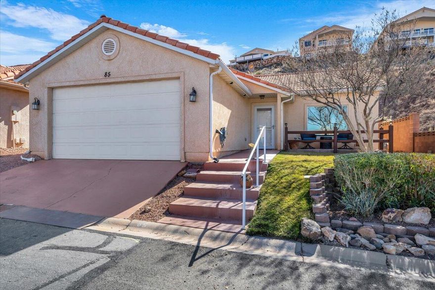 Welcome to this beautifully updated home in a charming and quiet 55+ community, showcasing incredible, unobstructed views of Pine Valley. Offering exceptional value and an easy, low-maintenance lifestyle, this thoughtfully designed single-level home features 2 bedrooms, 2 bathrooms, and a 2-car garage. Recent upgrades include new flooring, quartz countertops, a stylish tile backsplash, and all-new appliances. Vaulted ceilings enhance the open-concept layout, filling the home with natural light and creating a bright, open feel throughout. Step outside to a private patio and backyard with no direct rear neighbor--perfect for relaxing or entertaining while taking in the peaceful surroundings. Residents enjoy low HOA dues and access to a welcoming clubhouse, indoor pool and spa, pavilion, and game areas. Ideally located near popular walking, hiking, and biking trails, with shopping, dining, and entertainment just minutes away. Move in and start enjoying right away - furniture package available! Buyer/Buyer agent to verify all information.