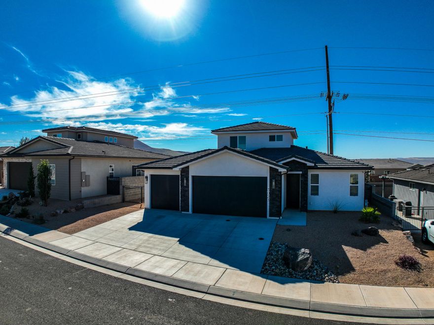 Beautifully upgraded and move-in ready inside and out! Functional floor plan with the primary suite on the main level — complete with its own laundry area and a walk-in/roll-in shower. Two additional bedrooms are located upstairs near the main laundry.Upgraded finishes throughout, including plantation shutters, custom soft-close cabinetry, and no-step access to the main level from every entrance.Fully landscaped backyard with a spacious covered patio — perfect for relaxing or entertaining. All appliances stay, including both sets of washers and dryers.Three-car garage with epoxy-coated floors and extra storage, plus bonus under-stair storage in the primary closet. Everything looks and feels brand new!