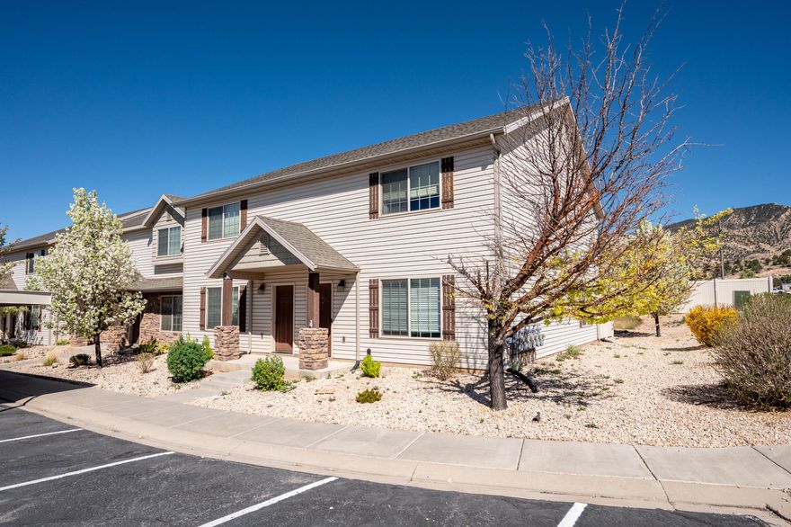 Desirable END UNIT in this great townhome community. 3 bedroom, 2.5 baths, this spacious home has upgrades such as custom tile work in both bathrooms, custom built-ins in the dining room and master, tile floors in wet areas. Includes an open kitchen w/lots of cabinets & pantry. Half bathroom downstairs; upstairs are three bedrooms & two full bathrooms. The master suite is huge w/plenty of room for furniture, walk-in closet & a large walk-in shower. There is a fenced back patio off the kitchen w/shed & room for BBQ & pets. The community features dedicated parking & lots of visitor parking, and this unit has west facing parking so ice melts fast. There is also a community park, pavilion & playground exclusively for residents. This well maintained unit is great for families or investors.