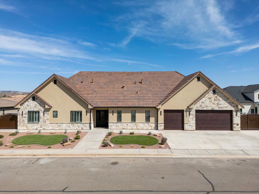 **~ THE EMBER HAVEN ~**
Newly completed 2025 single-level home in Ancestor Estates. Nearly 3,300 sq ft of luxury living with 2x8 construction and curated finishes. Open layout includes a private-entry casita—ideal for guests or multigenerational living. Features include Bosch/Subzero appliances, butler's pantry, built-in BBQ, dual tankless water heaters, epoxy garage floors, and surround sound. Outdoors: heated gunite pool/spa, high-end turf, xeriscaping, custom planters, and 100' RV parking. No HOA, Dixie Power, pre-wired holiday lights. Includes $5,000 moving credit + up to $10,000 lender credit with preferred lender. Pre-wired holiday lighting,Bosch appliances, Subzero Refrigerator. Washer and dryer is Included. This home was built for both everyday living and unforgettable entertaining.Located minutes from top rated schools, parks, Pickleball courts and shopping! This is St. George living at it's best! ***Bonus Incentives*** Receive $5,000 from the seller for moving expenses PLUS up to $10,000 in lender credit with a preferred lender!