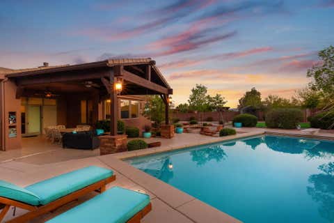 Photo of 207 N PAINTED HILLS DR, Ivins, UT 84738 (MLS # 26-274534)