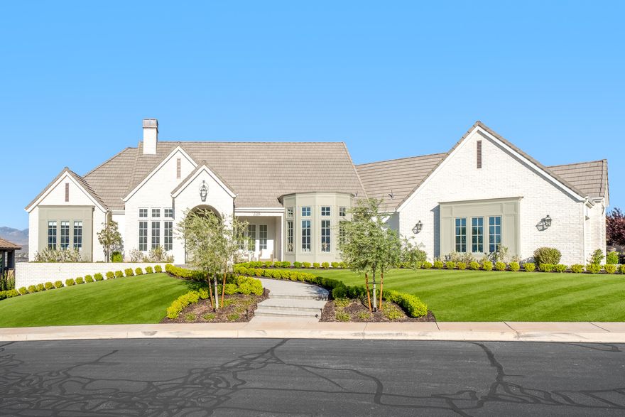 Perched in the prestigious enclave of Castle Rock, this exceptional custom-designed residence is a masterful blend of refined craftsmanship, modern luxury, and elevated coastal-inspired design—where West Coast sophistication meets the serenity of the desert. Every detail has been meticulously curated, showcasing the highest level of quality and artistry throughout.

The gourmet kitchen is a true chef's masterpiece, featuring premium Thermador, Bosch, and ILVE appliances, complemented by a stunning butler's kitchen equipped with a Gaggenau steam oven and a state-of-the-art smart coffee and espresso system. Rich custom woodworking, designer finishes, and bespoke details flow seamlessly throughout the home, creating a warm yet sophisticated ambiance. Expansive windows frame breathtaking, unobstructed views of the Black Desert Resort and Entrada Golf Course, with the dramatic red rock beauty of Snow Canyon State Park as a stunning backdrop offering a rare and captivating setting that blends luxury living with natural grandeur.

Step outside to your private backyard oasis, designed for resort-style living. Enjoy a self-cleaning pool with ambient lighting, elegant outdoor entertaining spaces, and a private in-home gymperfect for relaxation, wellness, and entertaining at the highest level.

The property also includes a thoughtfully designed accessory dwelling unit (ADU) with a private separate entrance, plumbed for a full kitchen, and complete with washer and dryer hookups and a full bathroomideal for guests, extended family, or luxury rental opportunities.

This is a rare opportunity to own a one-of-a-kind custom estate that delivers exceptional design, panoramic views, and true resort-style living in one of Southern Utah's most sought-after settings.