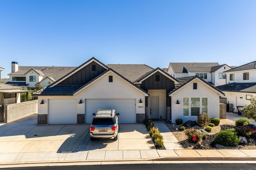 Welcome to 1863 S Heritage Place Dr in beautiful Washington, Utah -- where modern elegance meets everyday comfort. Built in 2022, this meticulously designed home offers 2,493 square feet of single-level, thoughtfully crafted living space. From the moment you step inside, you're greeted by a sense of openness and natural light, thanks to soaring ceilings and expansive windows that fill each room with warmth.  All information provided as a courtesy, interested buyers/parties to verify.