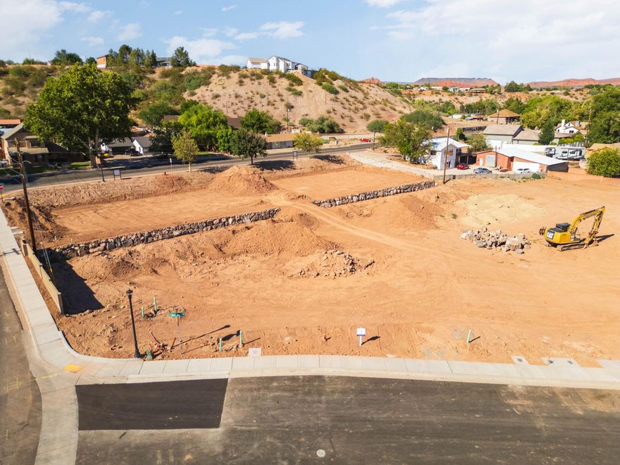 This .51 acre lot is available in Clara Crossing. Bring your preferred builder and build your dream home. This lot is zoned Residential Agriculture. Large animals are permitted with limitations. Permit is ready to be pulled. 

This development boasts convenient access to mountain biking, hiking, and ATV trails in the South Hills near Santa Clara. Clara Crossing is conveniently located off Gates Lane, adjacent to the historic Jacob Hamblin home, and just minutes from stunning outdoor destinations like Snow Canyon State Park, Gunlock State Park, and the renowned Tuacahn Amphitheater.