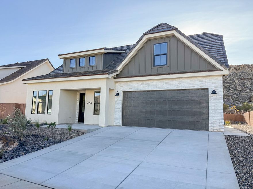 Custom builder, custom quality! Gorgeous craftsman-style home backing red rock open space—all natural backyard views you'll enjoy in large windows, a covered patio and private yard. Step inside and you'll find 9' ceilings, a separate dining room, flexible office/project/music room, and a spacious primary suite with its own laundry closet. Upstairs are three bedrooms w/walk-in closets, large family room, full laundry, tons of natural light, and mountain views. The kitchen is a showstopper with two-tone cabinetry, quartz countertops, hardwood floors, and upgraded trims and finish. A handy mudroom with bench and coat closet greets you at the entry. The insulated garage includes sidelights and a side door. Energy-efficient touches include zoned HVAC, ...see More... CAT5 ethernet and coax pre-wiring, plus extra sound insulation in the primary bedroom. Gas/electric hookups for both the kitchen and laundry, and even soffit outlets for outside holiday lights. Tons of with storage space in multiple extra closets. Second laundry hook-ups in master bedroom closet.

This home is loaded with extras from a builder who pays attention to every detailyou'll notice the difference. Call today for a private showing and see it in person.

Bonus: Preferred lender rate buydown may be available! Multiple programs could work for youask us for details.