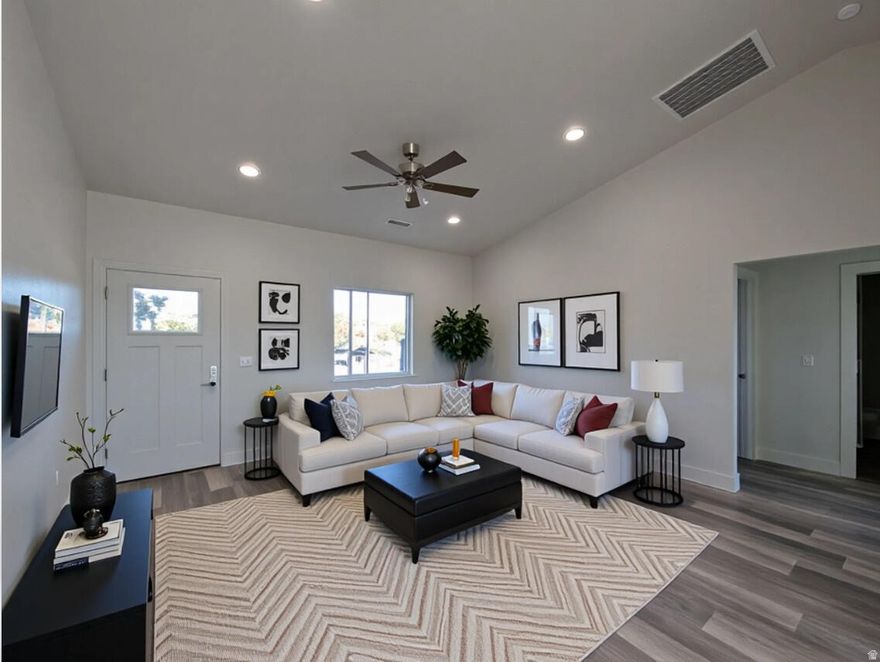 This brand-new 2025 3-bedroom, 2-bath home featuring vaulted ceilings and a versatile laundry/utility room. The light-filled living space offers sweeping red rock views through large windows, while the chef-inspired kitchen includes stainless steel appliances, a walk-in pantry, and thoughtful storage. The primary suite delivers a private retreat with modern finishes. Located just a few blocks from a new elementary school and a beautiful park, this home is ideal for anyone seeking convenience and comfort. Enjoy peaceful mornings or social evenings on the covered back patio. With close access to the Grand Canyon's North Rim, plus nearby national and state parks, this home is a haven for nature lovers and