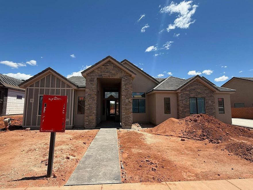 Gorgeous gable-style home: Large lot, giant slider in the great room, , casita, Red Mountain view, epoxy garage floor, wired for surround in the great room, and a 41.7 ft deep RV garage with RV parking on the side. The floor plan is open and light. The finishes are high-quality and beautiful: stunning iron door, combo of painted and knotty alder cabinets, gorgeous countertops, GE CAFE appliances, and Delta plumbing fixtures. Close to hiking and biking trails.