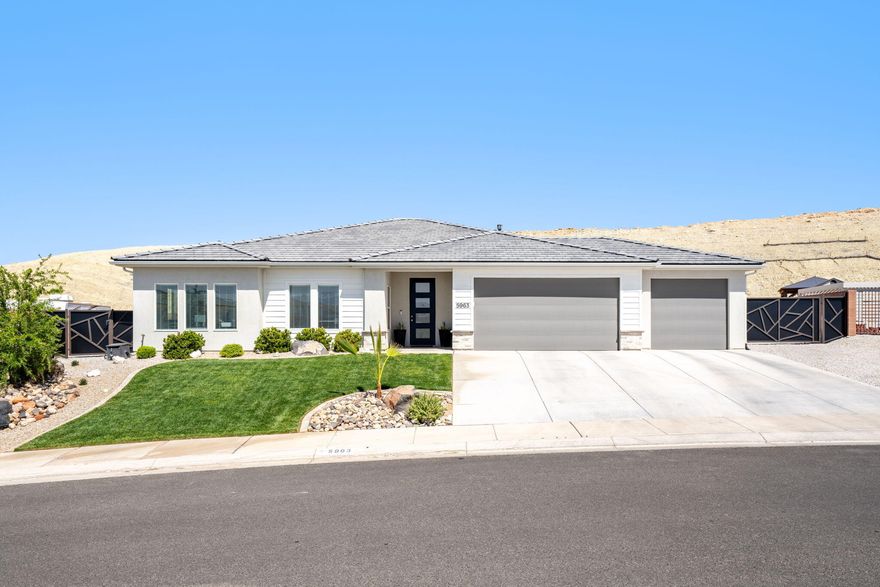 Enjoy the perfect blend of modern comfort, privacy, and adventure in this beautifully upgraded Southern Utah home surrounded by Pine Valley views and endless outdoor recreation. Thoughtfully designed with bright, inviting finishes throughout, the interior features oversized guest bedrooms, and a spacious primary suite with an enormous walk-in closet and gorgeous tile shower. The stunning kitchen is highlighted by quartz countertops throughout, light white and brown cabinetry, and beautifully upgraded higher-end finishes that create a clean, modern, and luxurious feel. The beautifully finished laundry room with matching quartz surfaces adds both style and functionality. Car enthusiasts and outdoor adventurers will love the oversized 3-car garage, super deep side RV and trailer parking that can easily accommodate multiple trailers and toys, plus a hardwired Level 2 electric car charger. Step outside to a peaceful backyard retreat that backs to a hillside, creating exceptional shade, privacy, and stunning Pine Valley views with no highway noise to interrupt the tranquility, all while being walking distance to the brand-new Southern Hills Park, the upcoming tech high school, and next door to world-class mountain biking, hiking, and off-road trails. Buyer to verify all information, deemed reliable, however buyer to verify all info including utilities, rental restrictions, and HOA information if applicable.