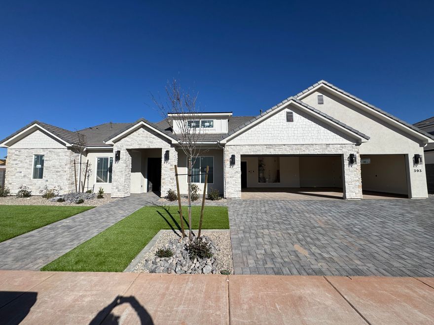 Beautiful New Trend Construction home in the desirable Finley Farms neighborhood. Impressive floor plan with oversized picture windows to fill the space with natural light + an office, 10' + ceilings throughout home & second family room. Primary Suite is remarkable with hardwood flooring, stunning tile work throughout, walk-in shower, big walk-in closet & extra cabinetry for all your storage needs. Gourmet kitchen with GE appliance package & oversized built-in fridge/freezer, dual oven! Quality materials & selections are evident from the rich custom cabinetry, hardwood flooring & quartz countertops. Outside, the yards are fully landscaped with low maintenance plants & paver patios/driveway. Come see this home today for yourself.