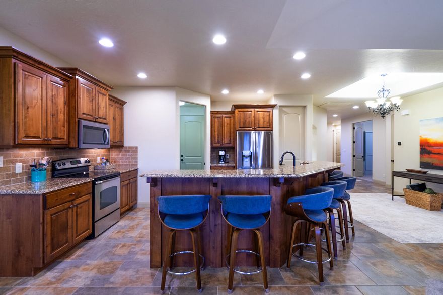 Step into a home that sets the standard. This former model residence is perfectly positioned on the golf course, offering front-row views and a level of finish you simply don't find in typical rentals.

From the curb, you're greeted with a freshly updated exterior and a sleek epoxy-coated driveway and garage--clean, sharp, and built to impress. Inside, the home opens up to a bright, refreshed interior with brand-new carpet and a layout that just works--easy, open, and comfortable without sacrificing style.

The kitchen is dialed in with a new microwave and flows effortlessly into the main living space, making it just as suited for quiet nights as it is for hosting. A built-in wall bed adds flexibility, giving you the option for a guest space, office, or both without missing a beat.

Set right on the golf course, this home comes fully furnished with utilities included--no setup, no hassle, just move in and start living.

Opportunities like this don't come around often. Clean, upgraded, and completely turnkey in one of the best settings you can ask for.