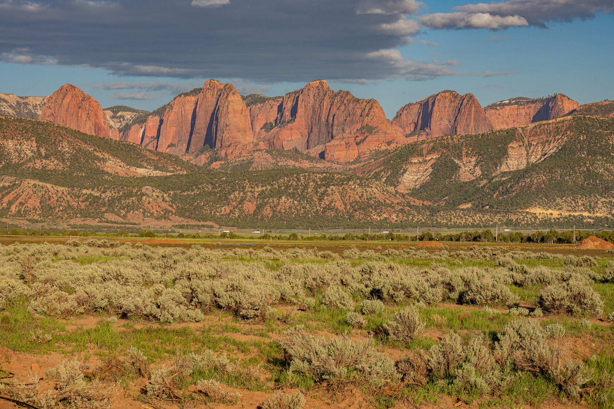 Beautiful views, peaceful sounds and a desired location. Whether looking at magnificent Pine Valley Mountain, or the ''fingers'' at Kolob Canyon, the views are stunning. Rare location! Kolob Heights subdivision Lot 5 is 6.24 acres with easy access from county maintained paved roads. Utilities including natural gas, electricity, and water provided and maintained by Washington County Water Conservancy. Less than an hour drive from St. George and Cedar City. Kolob Heights Subdivision!  Roads are all paved, road signs installed and are ready for you to build!