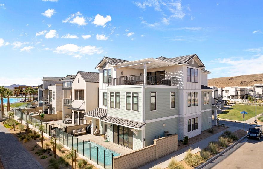 This home is being sold as a 1/8th Co-Ownership home. The price reflects the 1/8th ownership share price. Located on the boardwalk, just steps away from the white sand beach at the 2.5 acre lagoon and luxurious amenities of Desert Color. This home features a Private Pool, a Gourmet Kitchen, 6 Master Bedrooms, 2 Bunk Rooms, 3 Family Rooms, a sprawling dining area that seats 25+ of your friends and family, a 440 sq. ft. Party Deck w/firepit, and a Private Pool Deck on the Lagoon boardwalk. Each bunk room features 3 sets of bunkbeds, plus 3 trundle beds for a total of 9 beds per bunk room. At roughly 2.5 acres of surface area and a half-mile of white-sand shoreline, this home is just steps away the largest private lagoon in Utah.

The lagoon is the perfect place to swim, kayak, paddleboard, and much more. Walking/biking trails are already completed and ready for your use.

This home comes fully furnished and decorated by a professional interior designer and turnkey for incredible Southern Utah living.

Monthly operational costs are estimated at $697 per month. Call for a breakdown of costs.