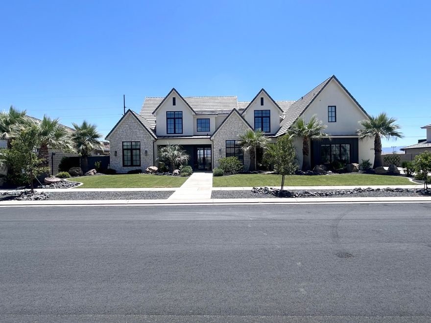 Experience Luxury Living in this 5600+ SQFT custom built home built in 2023. Experience the breath taking views with no backyard neighbors. Designed with comfort and entertainment in mind. This exceptional property features 5 bedrooms 5.5 baths including 3 private full suites. 
The gourmet kitchen is packed with premium upgrades including 2 dishwashers a huge walk in pantry, Drinking fountain, Hide a hose central vac and many other high end features through the home. 
The home also features a custom gas fireplace, Upgraded windows 3 Sliding glass doors, Built in speakers and wired security cameras.
The spacious layout offers a home gym, upstairs Kitchenette, 3 separate laundry areas including one in the master closet. The home was built with efficiency in mind featuring a tankless water heater, 2 separate EV Charging areas in the garage, 3 HVAC Systems that run on duel fuel. Park your 4 full size vehicles on the georgous Epoxy flooring with room to spare. 
Step outside to your own private resort style backyard featuring a pool, Hot tub, Putting green, full size Pickleball court and lighting system for those dark evenings, in ground trampoline, also grow your own produce in your amazing garden beds.Owner/Agent.