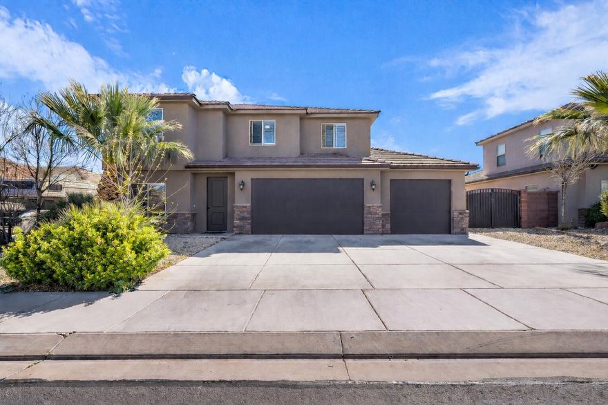 Beautifully upgraded home in the desirable Desert Canyons community featuring a functional and inviting open floor plan with 4 bedrooms plus an office/flex space. Enjoy multiple living areas with two spacious family rooms, including a second-level living room perfect for a game room, media space, or additional gathering area, while an upstairs bedroom offers its own private ensuite with a beautifully tiled shower. The home has been thoughtfully updated with newer flooring, upgraded carpet and padding, along with a newer oven, microwave, dishwasher, and water heater. Situated on a generously sized lot with mature landscaping and plenty of room to add a pool. Outdoor lovers will appreciate the direct access from Desert Canyons to miles of mountain biking and off-road trails, all while being just minutes from Costco, Smith's, In-N-Out, and the shopping, dining, and entertainment at Desert Color. Buyer to verify all information, deemed reliable, however buyer to verify all info including utilities, rental restrictions, and HOA information if applicable. Some images have been modified using AI to remove prior tenant furnishings, the property may appear slightly different in person than shown in the photos.