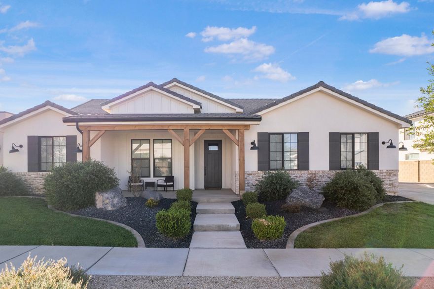 ENJOY NO BACK NEIGHBORS!  Unobstructed views, stunning sunsets & privacy is just the beginning of all this home offers.  Used only as a second home it shows & feels like new.  Wide open great room area making it ideal for gathering, spacious bedrooms, custom upgraded kitchen, large garages & covered front & back porches ensure this home will meet all your needs.  Desert Color is one of Southern Utah's finest communities.  The amenities are some of the best including one of the only beach like lagoons in Southern Utah ideal for paddle boarding, kayaking, swimming or sitting in the sun.  Big Shots Golf complex is minutes away along with multiple new restaurants & stores opening every day for your enjoyment.
Funiture, golf cart & hot tub available for sale in addition to sale price.