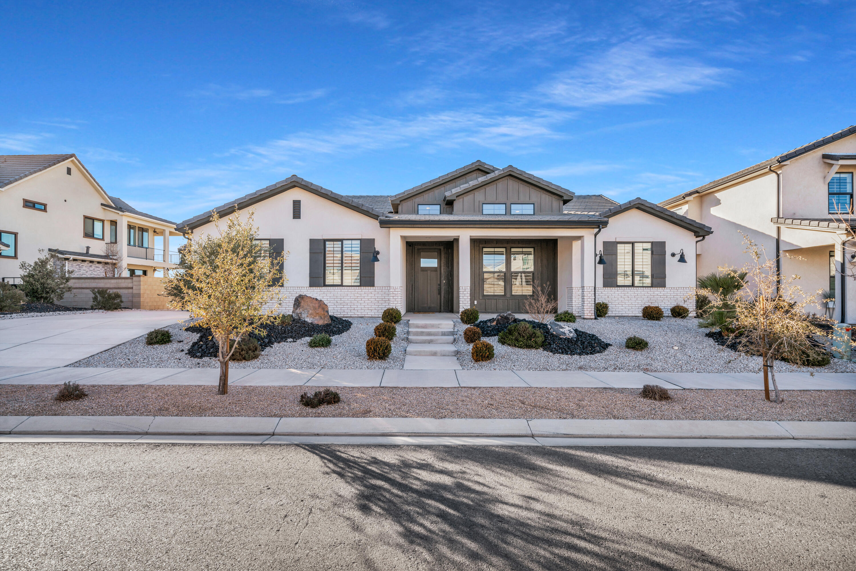 Welcome to the sought-after Desert Color community, where luxury meets natural beauty. This meticulously designed home offers stunning panoramic views of Pine Valley Mountain. Inside, a spacious, open layout connects the living, dining, and kitchen areas, ideal for relaxation and entertaining. The gourmet kitchen features high-end appliances and a large island. A private office can double as a bedroom. Enjoy a three-car garage and exclusive access to The Shores Resort's pool, sundeck, and lagoon. Close to shopping, dining, and outdoor recreation, this home blends modern luxury with resort-style living. Welcome Amber Ridge Dr, St. George, UT, where luxury meets breathtaking natural beauty in the sought-after Desert Color community. This pristine 4-bedroom, 2.5-bathroom home, with 2,347 sq. ft. of meticulously designed living space, offers an unparalleled living experience. Used only as a vacation retreat, this like-new residence boasts stunning panoramic views of Pine Valley Mountain, providing a serene backdrop to your everyday life.

Step inside to discover a spacious and open layout that seamlessly connects the living, dining, and kitchen areas, perfect for both relaxation and entertaining. The gourmet kitchen is a chef's dream, featuring high-end appliances, quartz countertops, and a large island that invites culinary creativity. A private office offers the ideal space for remote work or study, with the flexibility to transform into an additional bedroom or guestroom.

The three-car garage provides ample room for vehicles, storage, and outdoor gear, catering to all your practical needs. As part of the Desert Color community, residents enjoy exclusive access to The Shores Resort, complete with a resort-style pool, rooftop sundeck, and cabanas. The 2.5-acre lagoon is perfect for swimming, paddleboarding, and kayaking, while year-round events like food trucks, rooftop yoga, and outdoor movies ensure there's always something exciting happening.

Located close to shopping, dining, and outdoor recreation, with easy access to hiking, golf, and national parks, this home is a rare gem. Experience the perfect blend of modern luxury and resort-style living in a pristine, like-new residence with breathtaking views in one of Utah's most vibrant master-planned communities.