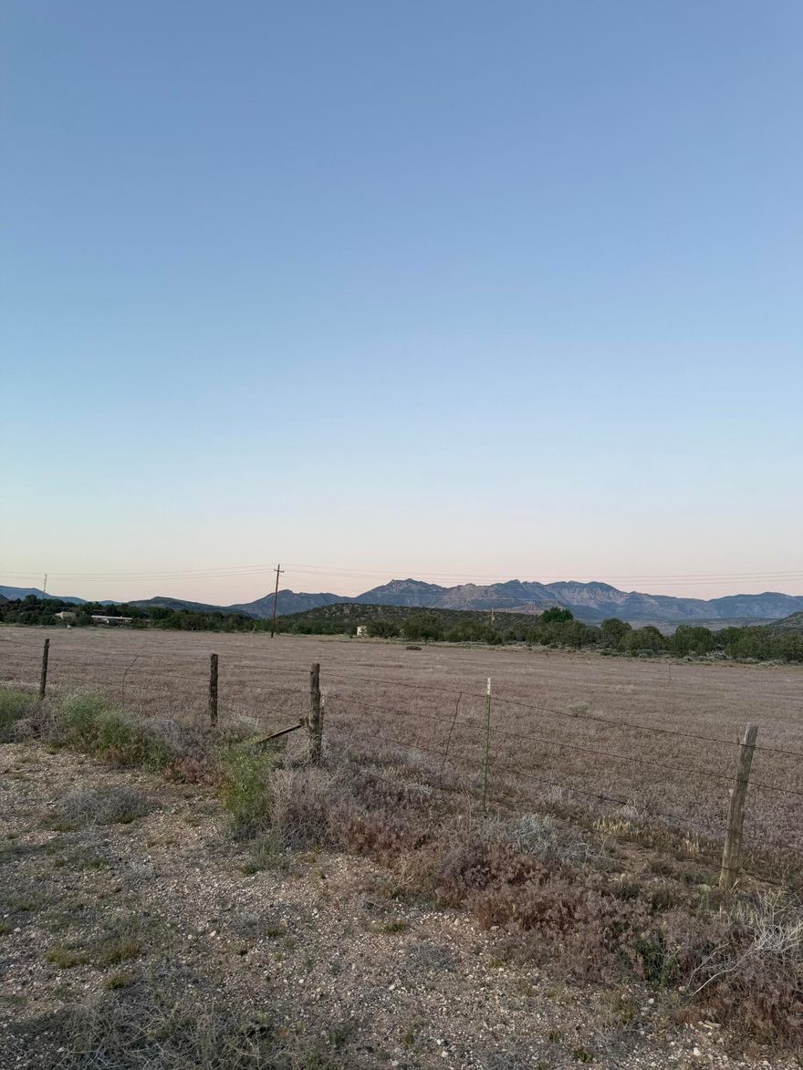 Make this property in Veyo your new home. Farm animals welcome. Higher elevation compared to St George makes for cooler summer days and darker starry night skies. The property fronts onto an asphalt county road with all utilities available except sewer. Includes culinary and irrigation water shares.
