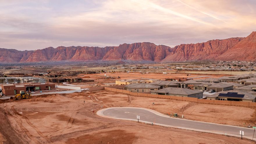 WELCOME TO YOUR SLICE OF PARADISE! NESTLED ON A SPACIOUS .23 ACRE LOT, THIS STUNNING PROPERTY BOASTS BREATHTAKING VIEWS OF RED MOUNTAIN AND SNOW CANYON. CHOOSE TO BUILD ON THIS LOT ALONE OR COMBINE WITH THE ONE NEXT TO IT FOR NEARLY A 1/2 ACRE BUILDING LOT. LOCATED CONVENIENTLY CLOSE TO SHOPPING AMENITIES, HIKING TRAILS, ATV ROUTES, AND ADJACENT TO BLM LAND, IT OFFERS ENDLESS OPPORTUNITIES FOR OUTDOOR ENTHUSIASTS AND NATURE LOVERS ALIKE. WHETHER YOU'RE DREAMING OF BUILDING YOUR DREAM HOME OR INVESTING IN A SCENIC RETREAT, THIS IS YOUR CHANCE TO OWN A PIECE OF SOUTHERN UTAH'S MAJESTIC LANDSCAPE. DON'T MISS OUT ON THIS RARE OPPORTUNITY!