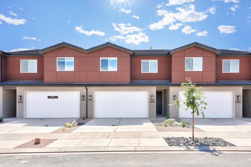 Step into the Horizon, where contemporary design meets refined comfort. This spacious 2-story interior townhome offers 1,650 square feet of living space, featuring 3 bedrooms and 2.5 bathrooms. Though an interior unit, it feels anything but enclosed, with ample natural light filling the open-concept layout. Perfect for relaxation or lively gatherings, the living spaces are thoughtfully designed to accommodate your lifestyle. The primary suite includes dual vanities, adding both functionality and style. With a 2-car garage and premium finishes throughout, Horizon provides a sophisticated and inviting lifestyle in the desirable Coral Canyon community.