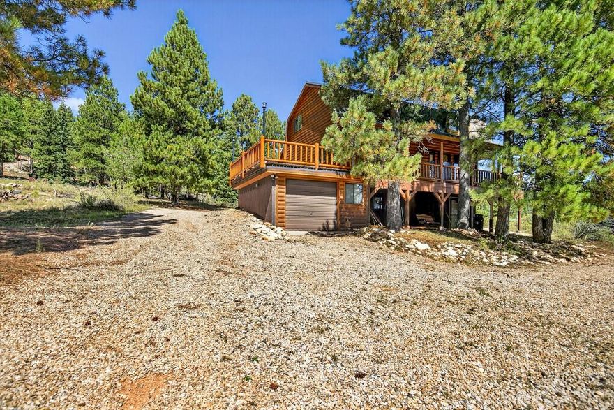 This beautiful 3 level mountain home is ready for some new adventures. The property sits on a picturesque lot overlooking the Strawberry Valley meadow. The cabin has 3 beds, 2.5 baths, covered decking, and a garage for the mountain toys. The main level has an open kitchen to the dining/living room which will be ideal for hosting family and friends. There is also a bathroom and pantry/storage area on the main floor. The upper floor includes the large main bedroom with a private covered deck. There is a also an additional bedroom and bathroom on the upper level. The lower level has a bedroom, family room, bathroom, and storage room. The home is heated by both a wood-burning stove and electric wall heaters. Outside you will find both covered/uncovered decking to relax and enjoy the fresh mountain air. There are 2 neighboring lots available to purchase for an additional $85K each. Rentals and trailer parking are permitted. The property is located in the Strawberry Valley Estates subdivision with CCR's and an POA to maintain the private runway airstrip. There is easy access to the Duck Creek ATV Trails System. Call for a personal showing or more information.