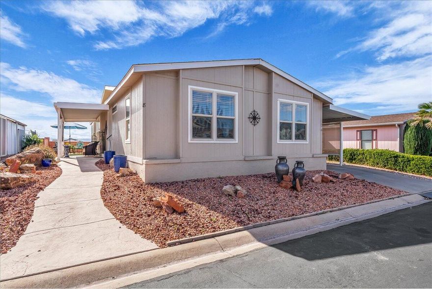 Experience the pinnacle of quiet adult living in this impeccably remodeled Rainbow Ridge home, where modern amenities meet affordability. Every inch of this 55+ sanctuary has been thoughtfully upgraded, featuring a new kitchen, an expansive family room, and a master suite designed for ultimate relaxation with its oversized walk-in shower and spacious closet. Freshly finished with new paint and carpet throughout, the home offers total peace of mind with practical additions like a new water heater and a dedicated laundry room with a utility sink. Outside, your private retreat awaits, complete with a hobbyist's shop, garden beds, and serene views. Coupled with great community amenities—including a pool, indoor hot tub, and fitness center—this home offers a turnkey lifestyle