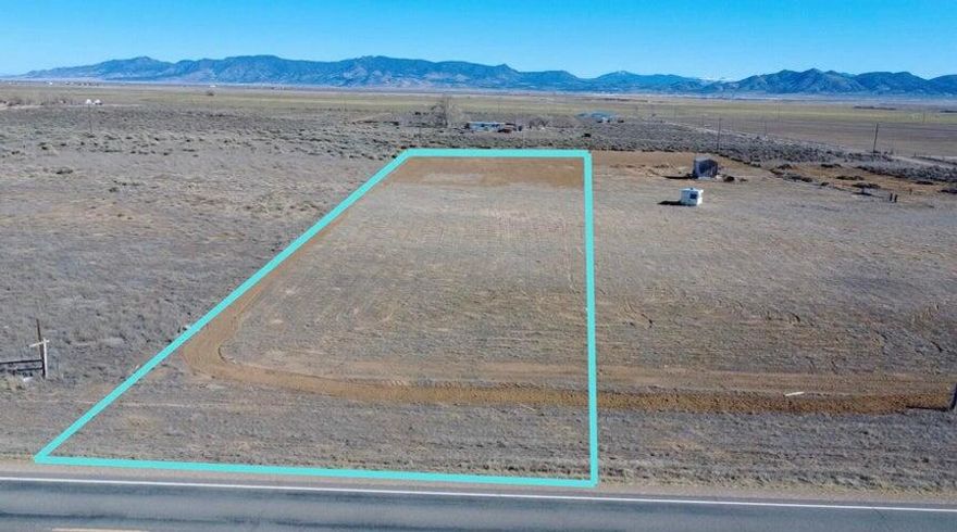 Rare opportunity to own 2.18 acres near Beryl Junction with paved Highway 18 access and 1 AF of valuable water right (#71-3536). Recently cleared and ready to use. This property includes a shared well agreement with the parcel to the South, which has recently installed a brand-new well for connection. Power is close by from the property to the South. Ideal for a primary residence, second home, cabin, or private family retreat. Enjoy wide open views, dark skies, and rural freedom with quick access to town. Located just 10 minutes from Enterprise for gas, groceries, schools, and medical services, and under an hour to Cedar City and St. George. A versatile property with infrastructure, water, and accessibility already in place. come take a look.