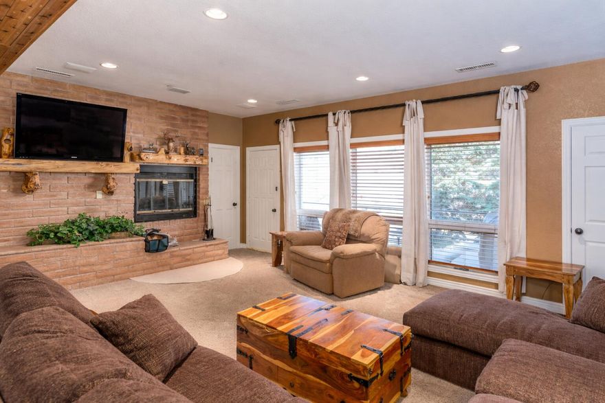 Perfect Large-group getaway or investment condo nestled in the beautiful mountain community of Brian Head. Right across from the fishing pond and playground and very close to Brianhead Resorts chairlifts! . Adorned with your own indoor Hot tub an pool table! Enjoy snuggling up next to the wood-burning fireplace and looking off the balcony to the stunning views! This condo comes furnished and sleeps 13 in beds with plenty more space on floors and couches