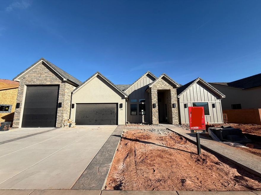 Finally...the home that has it all! Large lot, giant slider in the great room, butler's pantry, casita, a view of the Red Mountain, 20x40 pool, epoxy garage floor, wired for surround in the great room, and a 36 ft deep RV garage with a 12x14 door!! There is also room for RV parking on the side.  In addition to the casita, this home also has a guest suite.  The floor plan is open and light.  The finishes are high-quality and beautiful: stunning iron door, combo of painted and knotty alder cabinets, gorgeous quartz countertops, elegant tile fireplace, GE CAFE appliances and hardwood floors in the Entry, Hall, Great Room, Kitchen, Dining Room, Pantry, Mudroom Den & Casita.