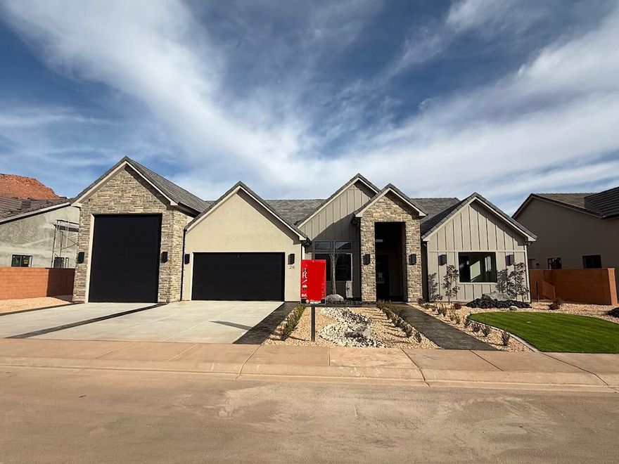 Finally...the home that has it all! Large lot, giant slider in the great room, butler's pantry, casita, a view of the Red Mountain, 20x40 pool, epoxy garage floor, wired for surround in the great room, and a 36 ft deep RV garage with a 12x14 door!! There is also room for RV parking on the side.  In addition to the casita, this home also has a guest suite.  The floor plan is open and light.  The finishes are high-quality and beautiful: stunning iron door, combo of painted and knotty alder cabinets, gorgeous quartz countertops, elegant tile fireplace, GE CAFE appliances and hardwood floors in the Entry, Hall, Great Room, Kitchen, Dining Room, Pantry, Mudroom Den & Casita.