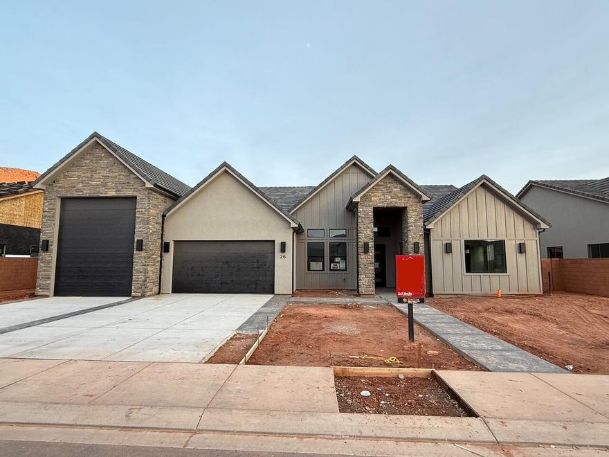 Finally...the home that has it all! Large lot, giant slider in the great room, butler's pantry, casita, a view of the Red Mountain, 20x40 pool, epoxy garage floor, wired for surround in the great room, and a 36 ft deep RV garage with a 12x14 door!! There is also room for RV parking on the side.  In addition to the casita, this home also has a guest suite.  The floor plan is open and light.  The finishes are high-quality and beautiful: stunning iron door, combo of painted and knotty alder cabinets, gorgeous quartz countertops, elegant tile fireplace, GE CAFE appliances and hardwood floors in the Entry, Hall, Great Room, Kitchen, Dining Room, Pantry, Mudroom Den & Casita.