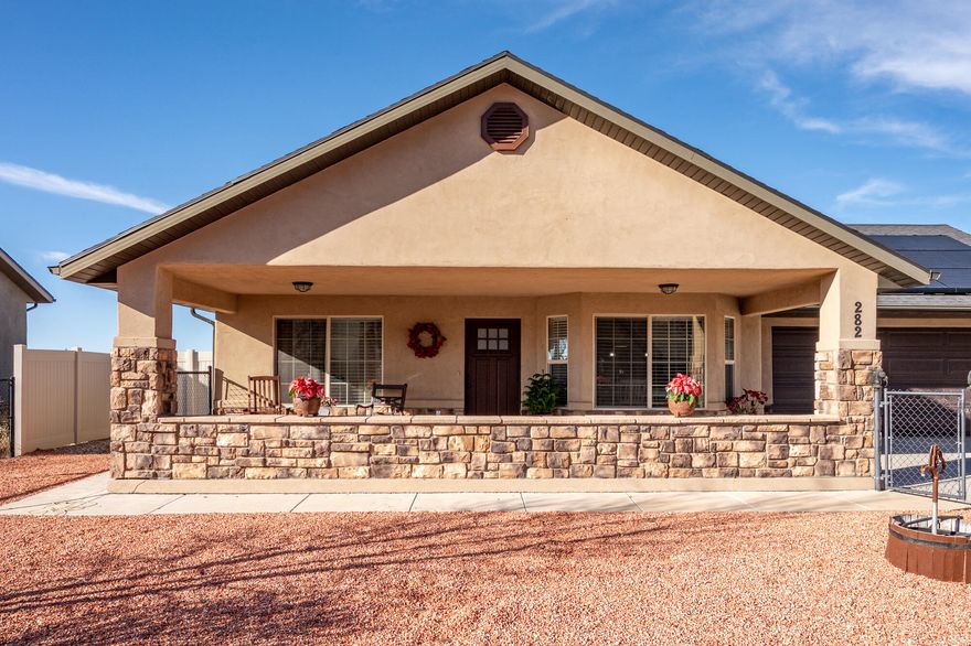 Fantastic single-level home in a quiet, scenic location near the mountains. This fully handicap-accessible home features a spacious covered porch, perfect for taking in the incredible mountain views. Immaculately cared for and thoughtfully designed, the property offers a fully landscaped, fenced yard ideal for relaxing or entertaining. Enjoy the convenience of a two-car garage and the added benefit of solar panels and a wood burning stove for exceptional energy efficiency. A rare opportunity for comfort, accessibility, and peaceful living in a beautiful setting.