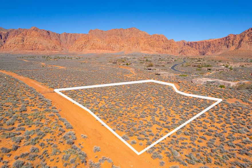 Exceptional 1.42 acre Kayenta view lot near Rock Park is perfectly suited to maximize Santa Clara River Valley and Kayenta Cliff views. This private estate-sized building site will easily fit every aspect of your new dream home. Treat yourself to inspiring surroundings of magical red rock cliffs, waterfalls after a desert downpour, the 6000-acre Santa Clara River Reserve, world-class hiking and biking. Near Kayenta Art Village shops and Xetava Gardens Cafe, limitless recreation and so much more. Bask under star-filled night skies and enjoy the wondrous gifts that Kayenta's landscape has to offer. This lot is not currently part of the H.O.A. and will be incorporated when permits are issued. Owners have a Letter of Intent from the Kayenta Developer to stub in utilities when permits are pulled.