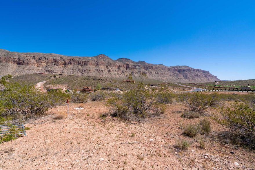 A rare land opportunity in one of Southern Utah's fastest-growing lifestyle destinations. Offering approximately 15 acres across multiple tax IDs, this property is ideally located just minutes from Zion National Park and Sand Hollow State Park, and directly adjacent to the award-winning Copper Rock Golf Course. With exceptional scenery and convenient access to premier recreation and amenities, the site is well suited for a luxury residential community, large-acre estate lots, or a signature development project. With a preliminary plan already available, the acreage provides a flexible canvas for a variety of architectural styles and layoutswhile still allowing buyers to bring their own vision and design team. Expansive natural surroundings, panoramic mountain and cliff views, and quick access to outdoor recreation make this a high-demand location for today's buyers seeking space, privacy, and connection to nature. Making this an appealing choice for both local and out-of-state buyers looking for a scenic yet accessible retreat. The region's rising market interest, strong tourism economy, and premium view corridors create a compelling long-term investment with excellent resale potential. Opportunities like thissize, views, adjacency to golf, and recreation accessrarely become available. Secure your foothold in one of Southern Utah's most desirable growth areas and bring your development vision to life.