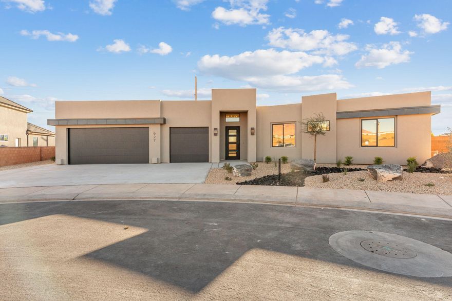 Come see this Jon Crockett masterpiece. This home has a spa like bath in the owner's suite and Jr suite close by for the aging parent or
lucky teen. This home comes fully landscaped with a water feature and fire pit, not to mention a strategic roof deck to capture the beautiful red mountain and
other scenic vistas, or to just bask in the sun. Add the quality craftsmanship throughout and this one is easy to love. Come by and take a look, but beware,
you will likely fall in love.