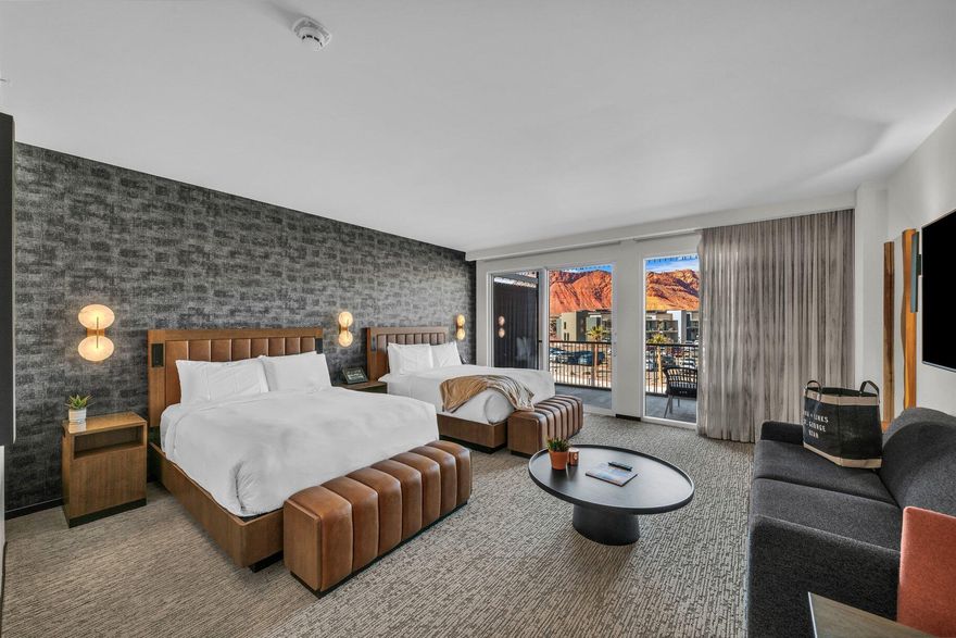 This Deluxe Double Queen Studio Condo in The Black Desert Resort offers breathtaking views of the iconic red rock landscapes and Snow Canyon. Fully furnished and completely turnkey, featuring a spacious layout and a well‑appointed kitchenette equipped with Wolf and Sub‑Zero appliances.

Ownership includes membership to the Black Desert Club, granting access to world‑class amenities, luxury services, and an unmatched lifestyle experience.