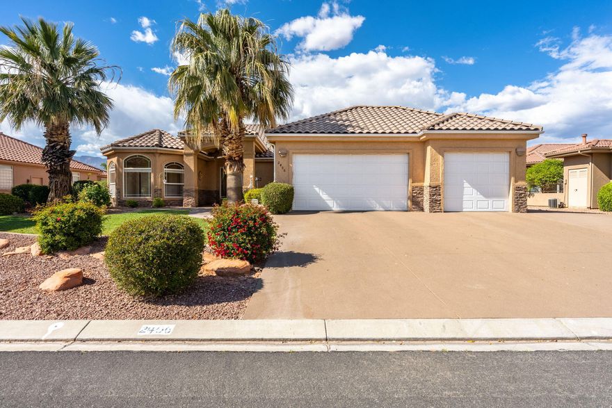 Gorgeous home located in Sky Mountain Golf Estates, backing directly to the golf course with breathtaking, unobstructed mountain and fairway views right out your back door. This beautifully updated home features a remodeled kitchen and bathrooms, stunning new hardwood floors, and resurfaced concrete all around the property. The spacious master suite offers a walk-in shower, soaking tub, dual sinks, and a large walk-in closet. Plus, 1 bed & 1 bath casita! Enjoy the incredible views through the many windows designed to let in natural light and showcase the scenery. Conveniently located near excellent schools, parks, Sand Hollow State Park, sand dunes, and Zion National Park, this home is perfect for those seeking a peaceful retreat with access to outdoor adventures in a friendly community.